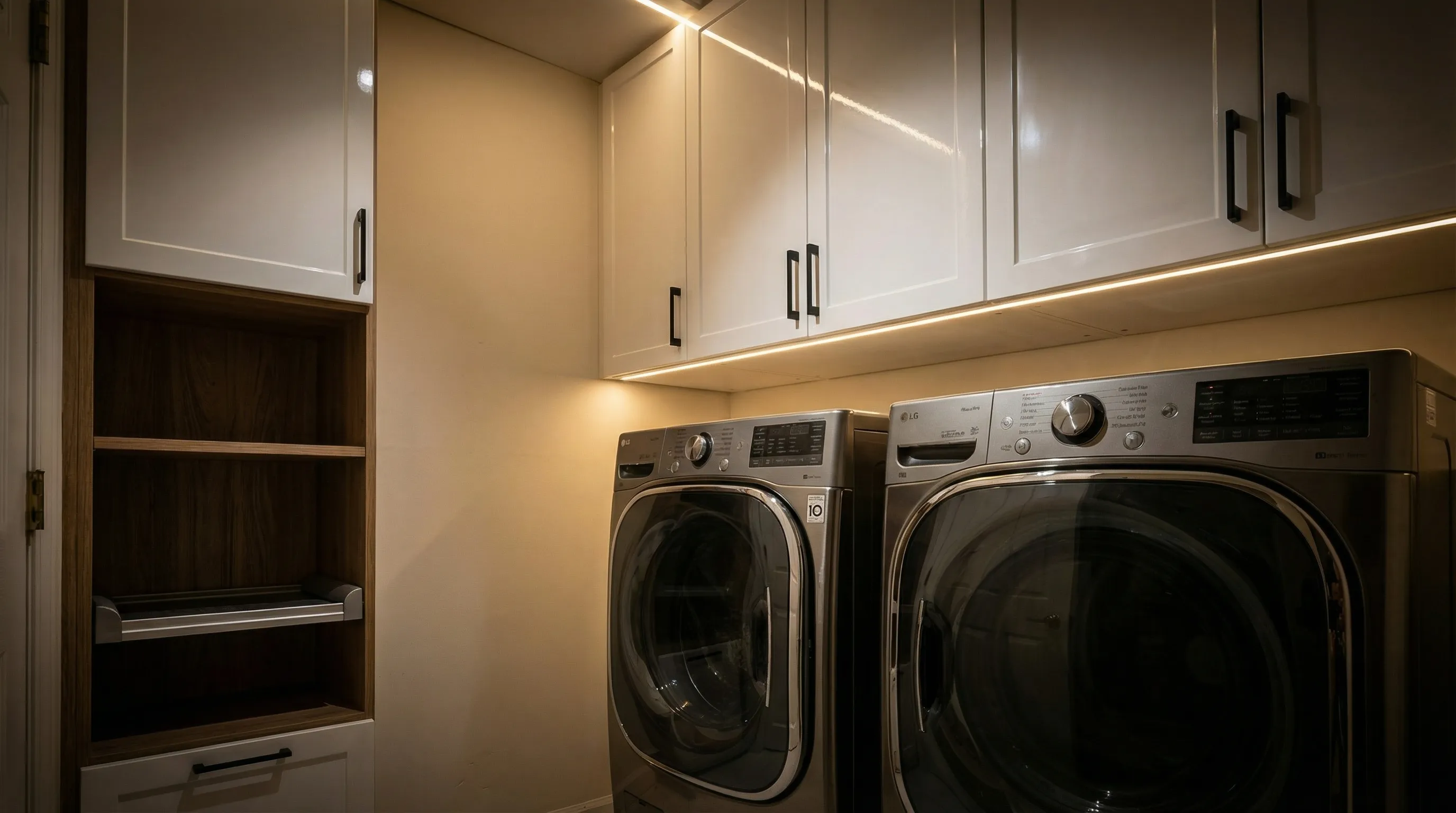 Custom Luxury Laundry Room Cabinetry with Built-in Hampers